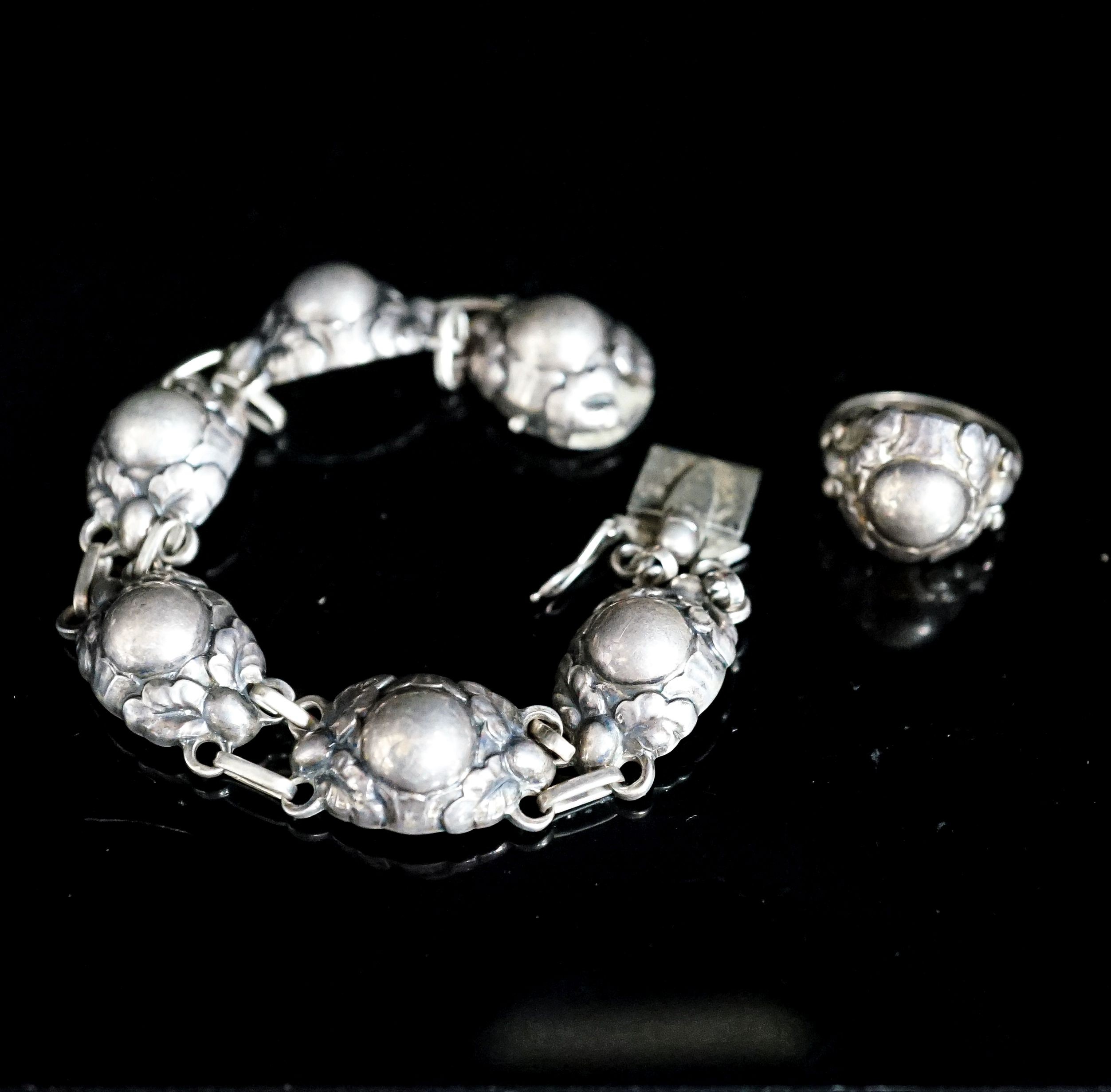 A Georg Jensen sterling bracelet, no. 57A, 18.5cm and a similar ring, no. 11A.